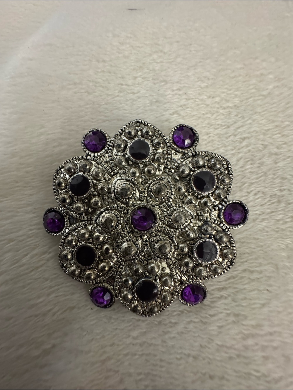 Silver-Tone Filigree Brooch with Purple Crystal Accents